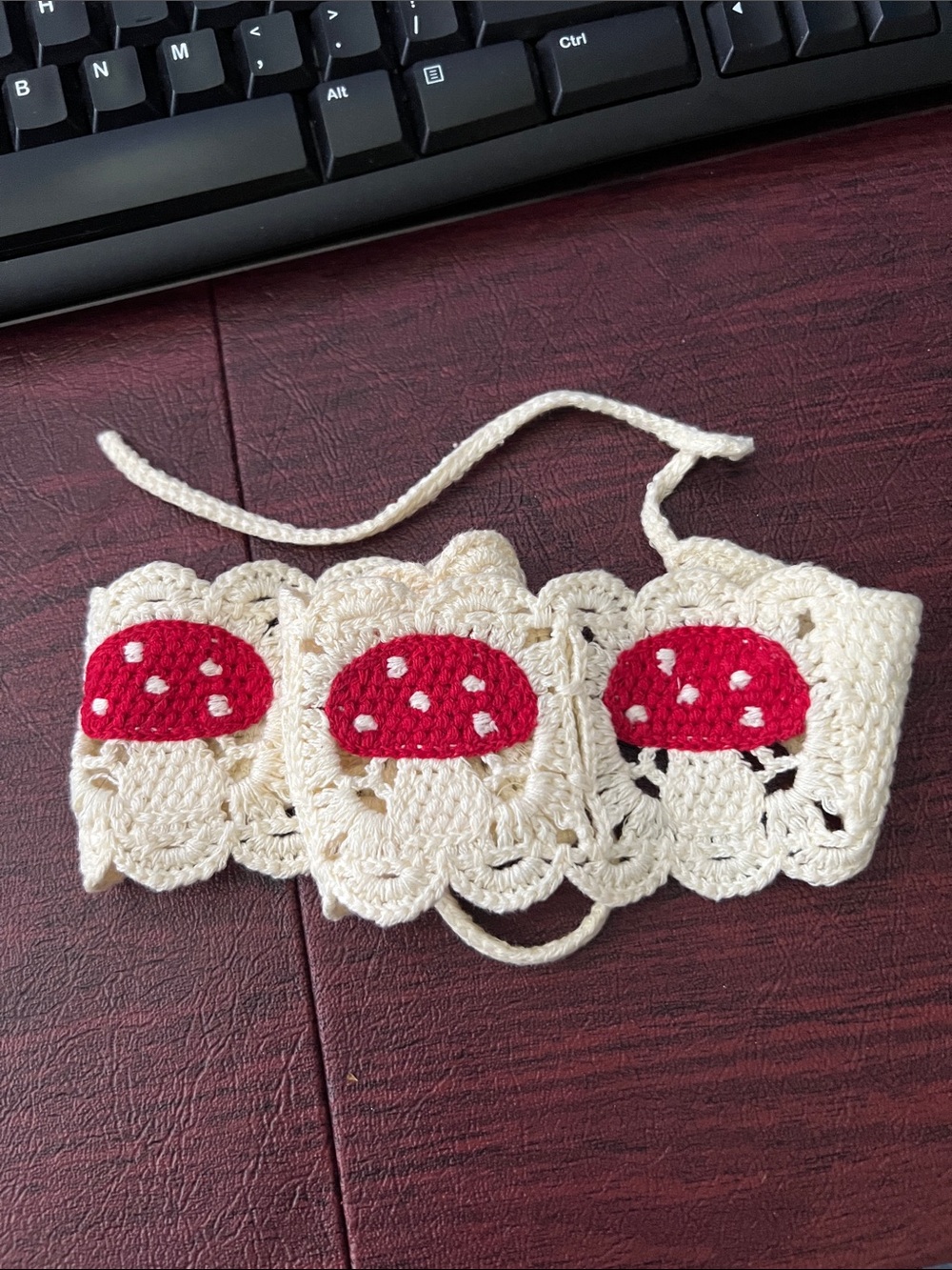 Cream Crochet Headband with Red Mushroom Accents